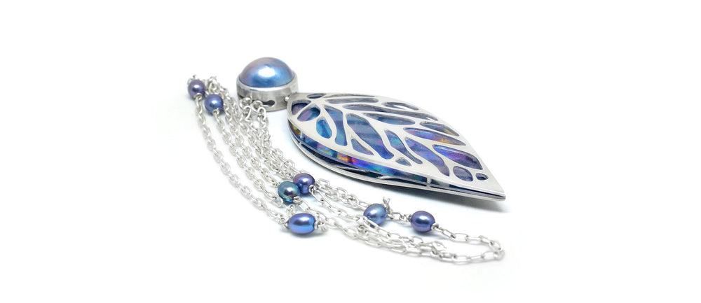 silver titanium and pearl leaf shaped pendant