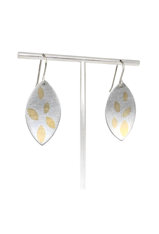silver leaf shaped earrings with gold inlay leaf pattern