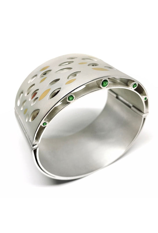 silver cuff bracelet with gold inlay leaf pattern and tourmalines