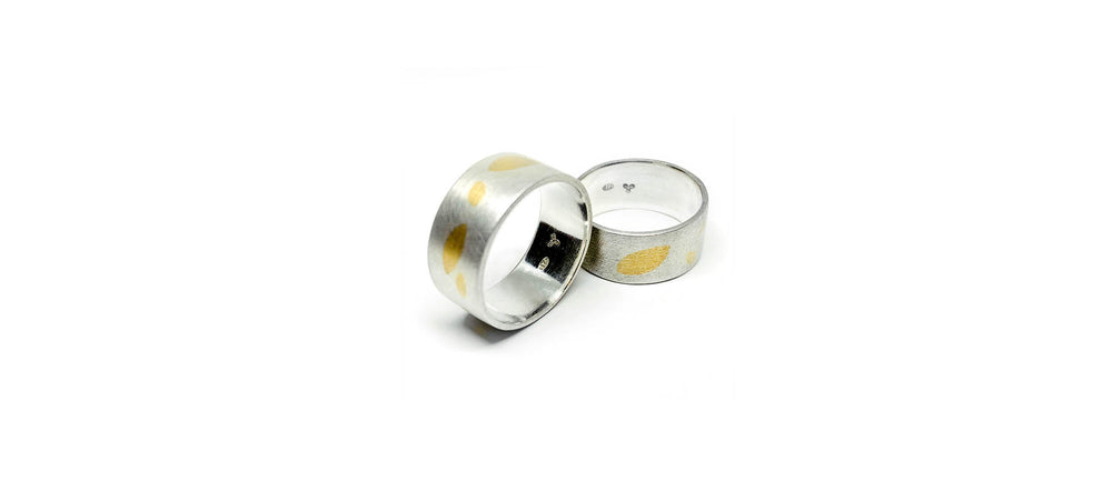 silver rings with gold inlay leaf pattern